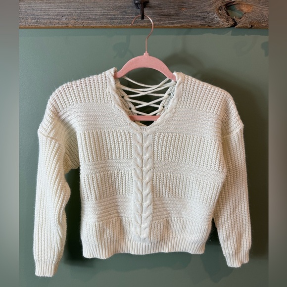 Elegant Cream Sweater with Lace-Up Detail - Picture 3 of 8